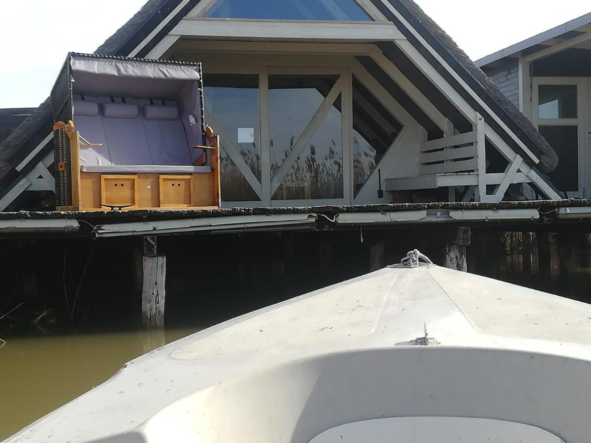 רוסט Pfahlbau Sunset II Toplage Inklusive Elektroboot מראה חיצוני תמונה