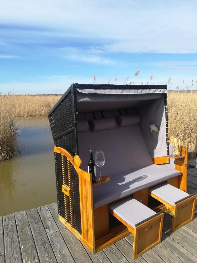 רוסט Pfahlbau Sunset II Toplage Inklusive Elektroboot מראה חיצוני תמונה
