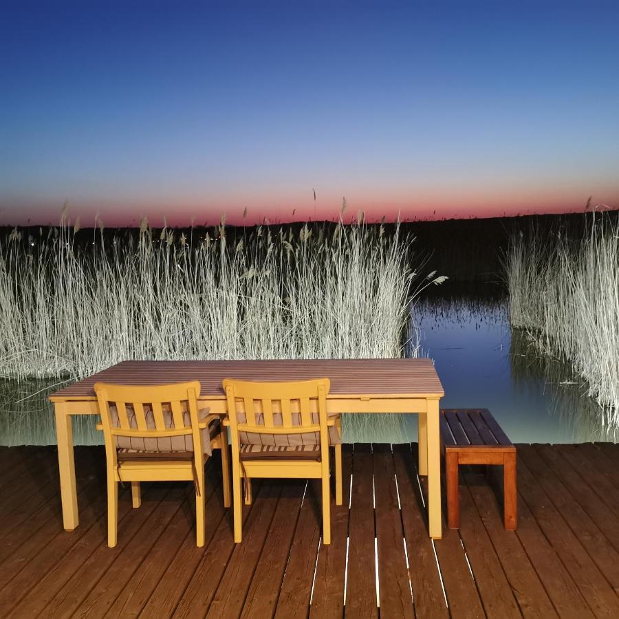 רוסט Pfahlbau Sunset II Toplage Inklusive Elektroboot מראה חיצוני תמונה